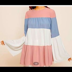 This beautiful 3 tiered blouse will grab your attention.